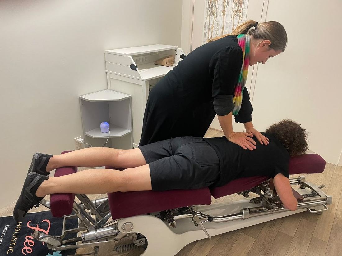Dr Kelly Voschezang adjusting a patient at the clinic
